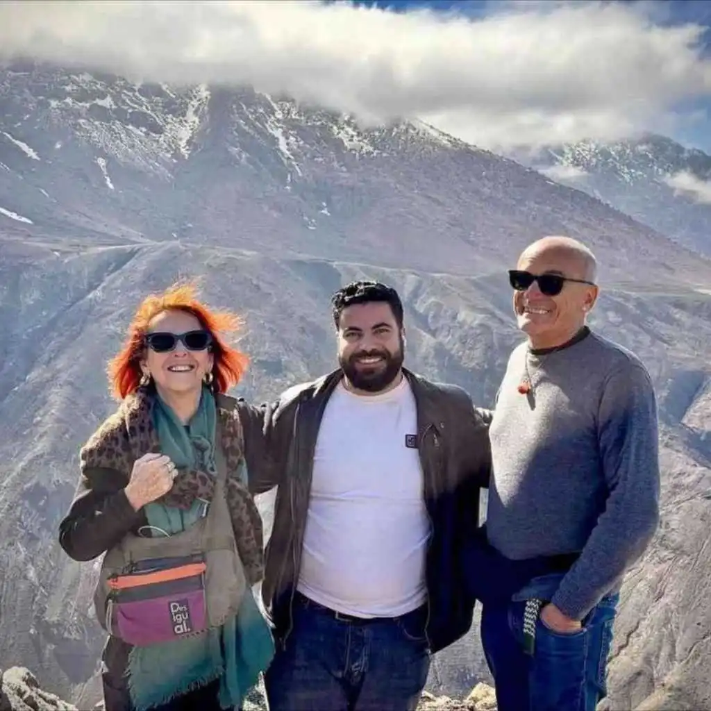 Yassine with happy travellers in the Atlas Mountains